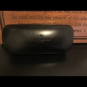 Coach eyeglass case.